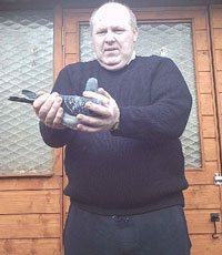 Terence McCrudden holding the champion Oisin